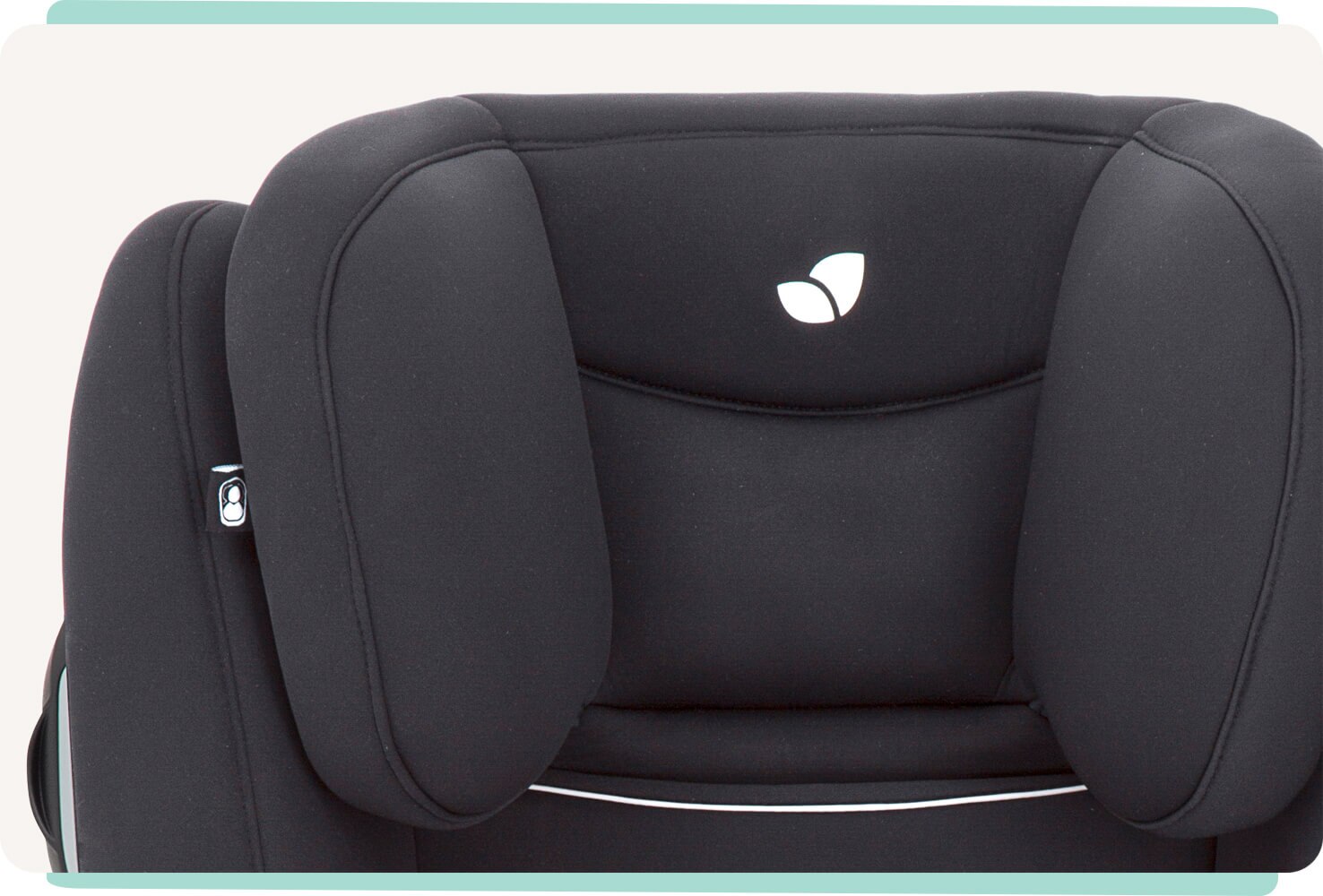  Closeup of the Joie Duallo booster car seat headrest in black.
