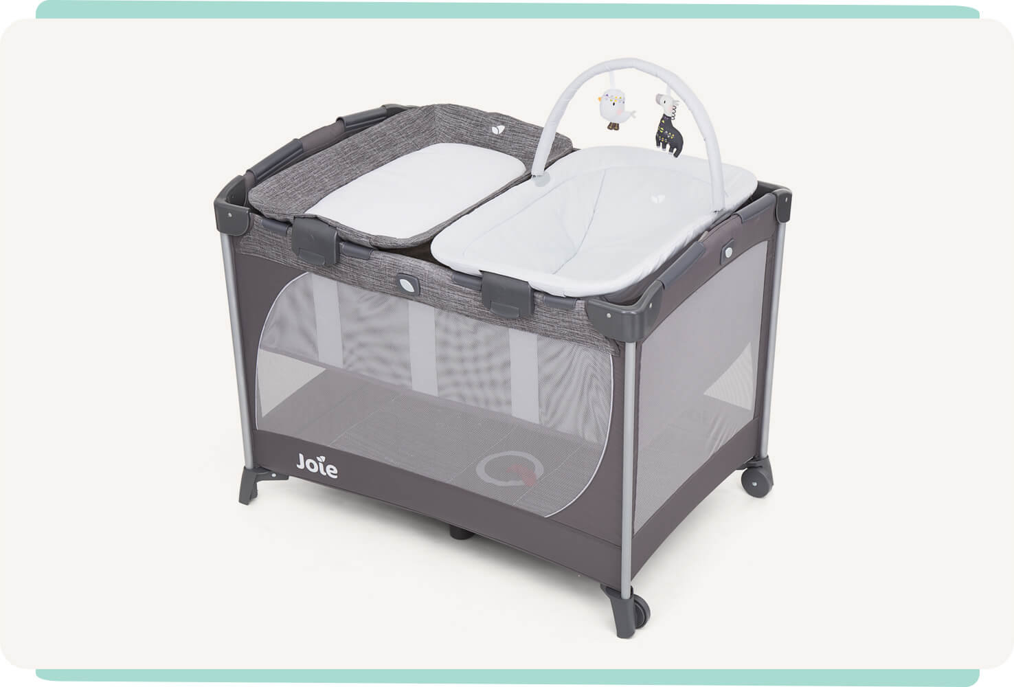 Joie travel cot commuter change & snoozer in grey with bassinet, changer, and snoozing seat at a right angle.