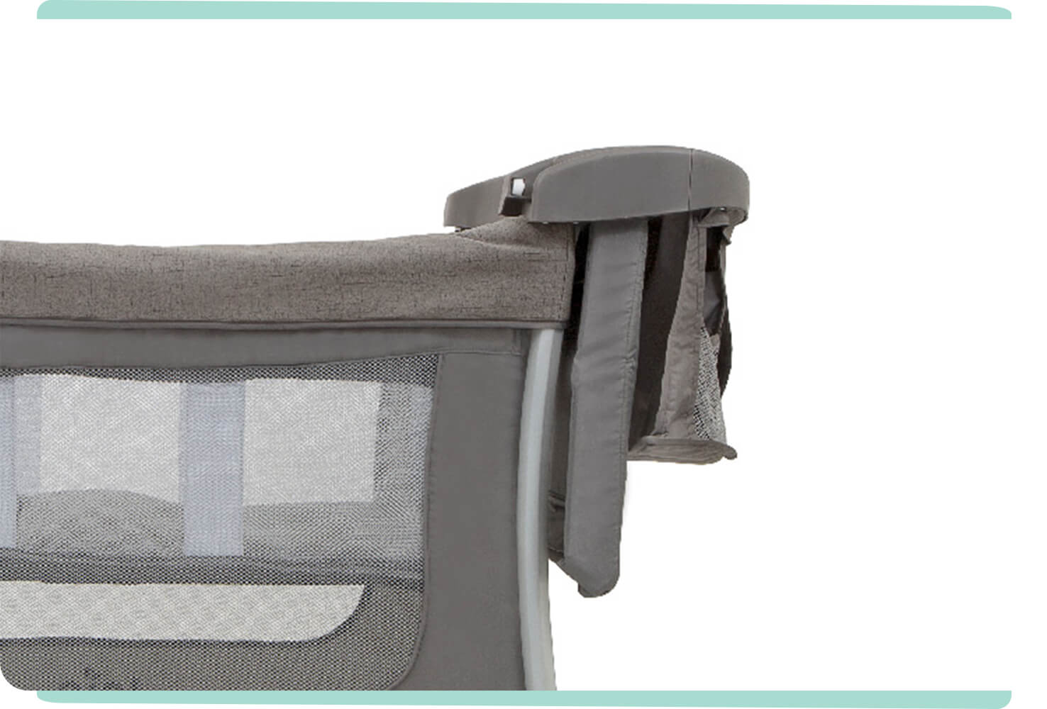 A close up view of the changing table storage on the side of the Joie travel cot illusion in dark gray. 