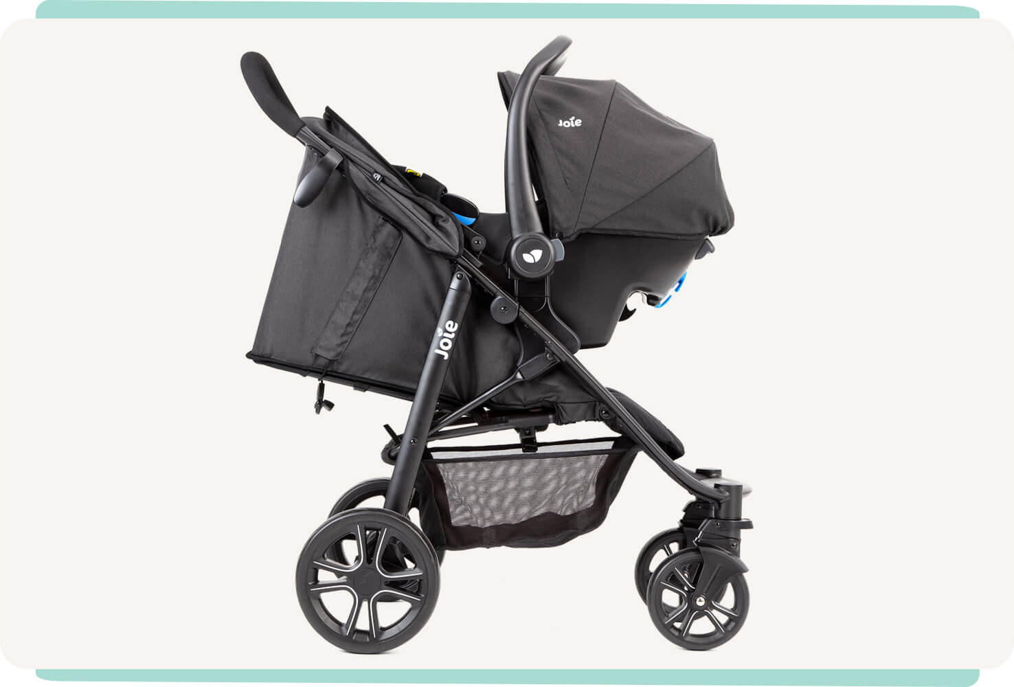 Black Joie Litetrax E travel system with the infant car seat attached to the stroller, facing toward the right in profile.