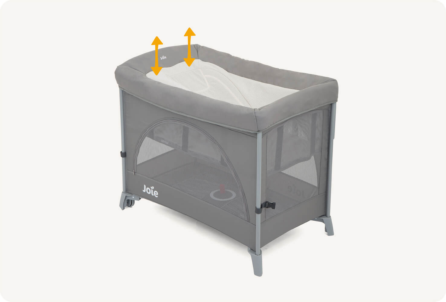 A gray and cream colored Joie Daydreamer napping seat attached to a Kubbie travel cot sitting at an angle facing right, with two orange arrows pointing up indicating that it removes