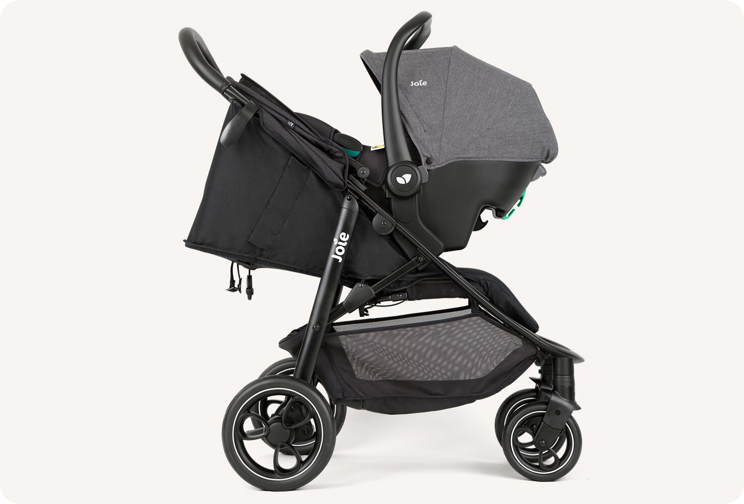  JoIe black litetrax S stroller with infant carrier. 