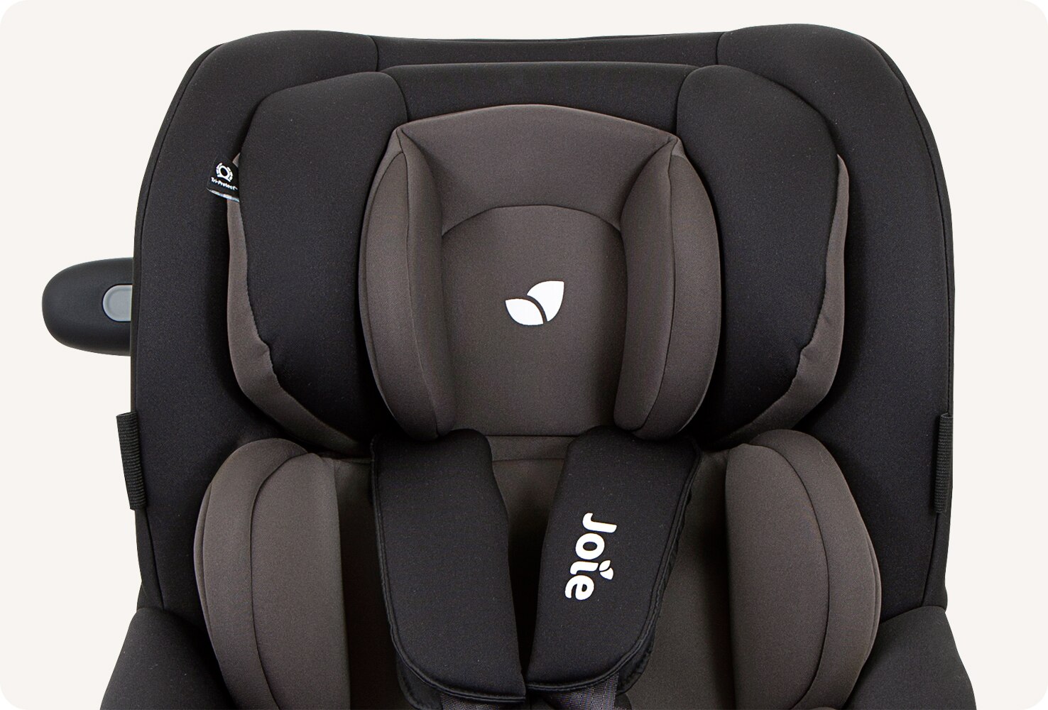 Closeup of the headrest on a black and gray Joie i-Venture R car seat.