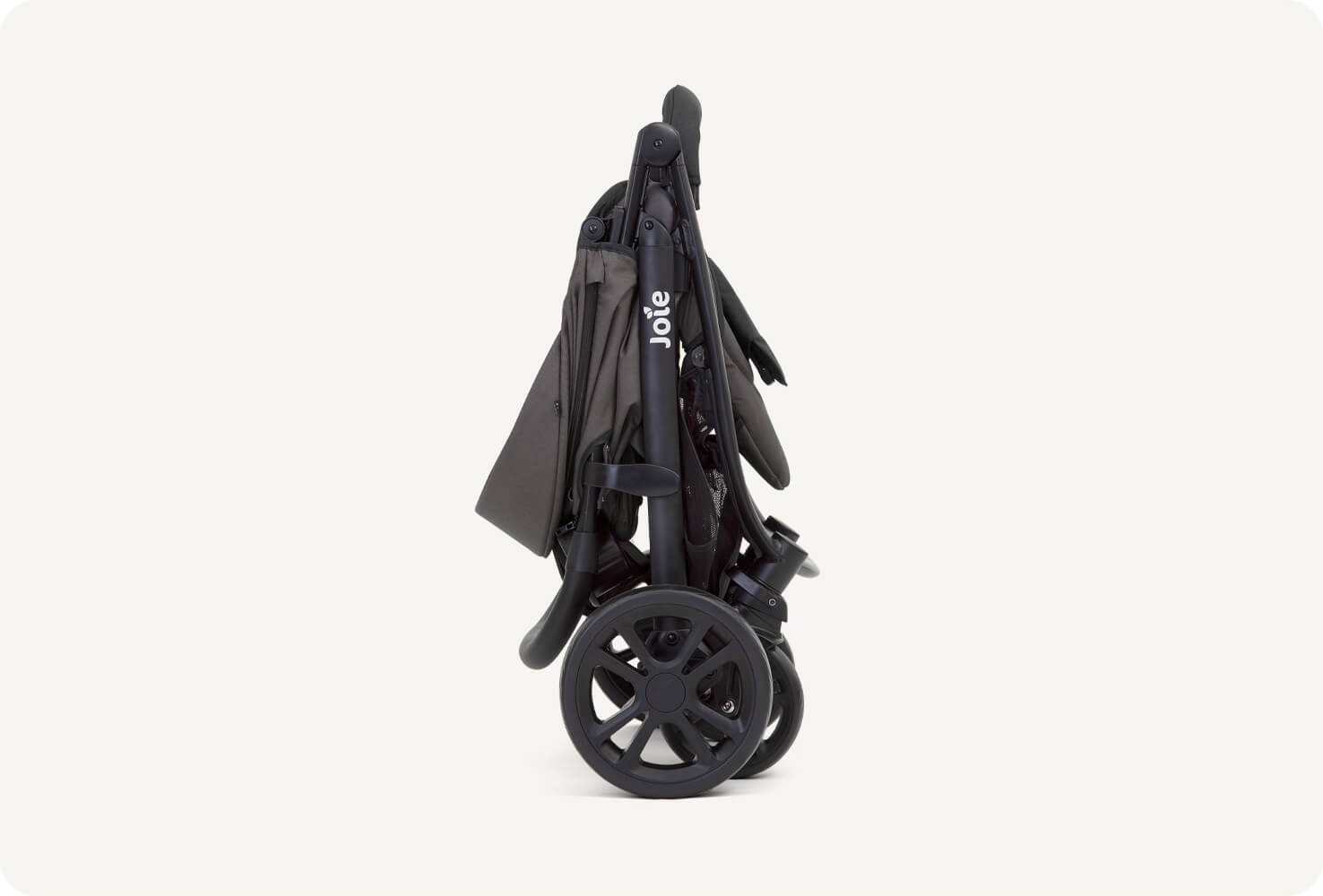 A black Joie Litetrax 4 stroller folded in profile.
