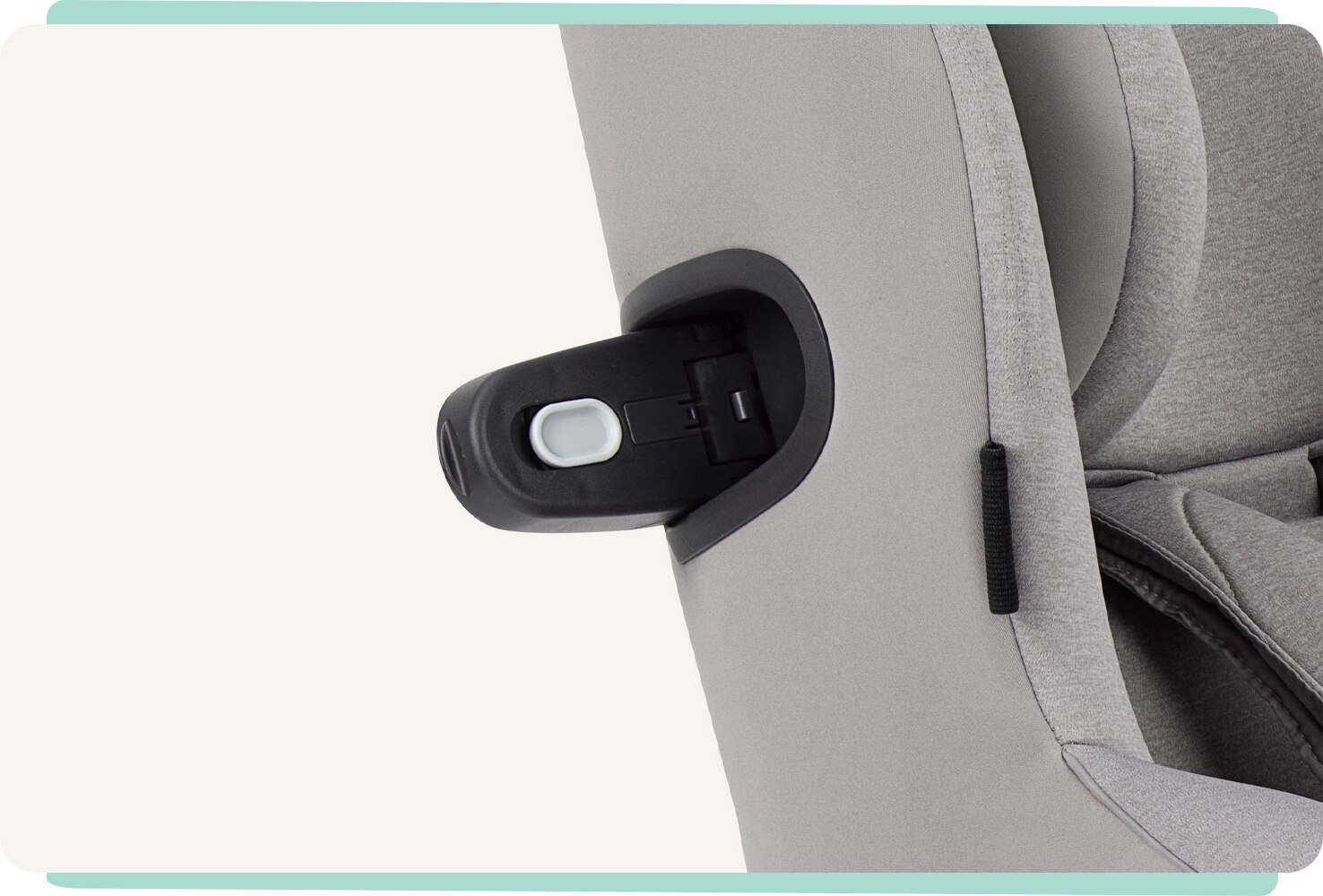   Closeup of side impact protection wing on a light gray Joie I-Spin 360 E car seat.