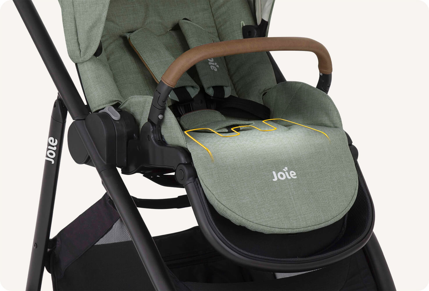 Zoomed in view of the seat on a Joie versatrax pram.