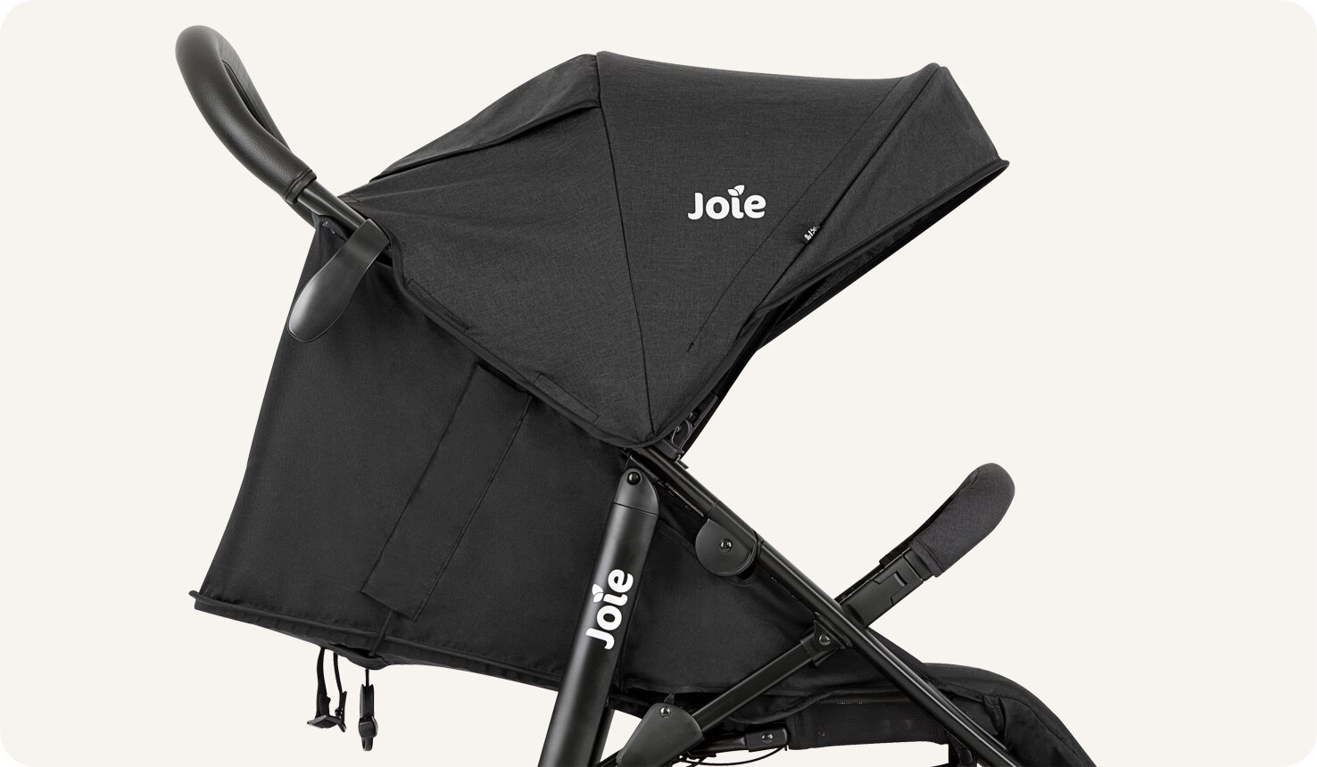  JoIe black litetrax S stroller fully reclined facing right. 