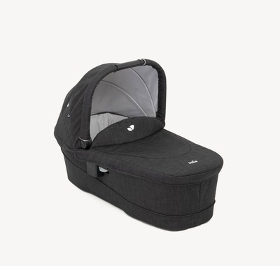 Joie Ramble xl carry cot in black on a right angle.