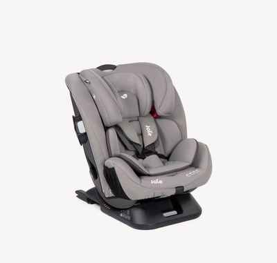  The Joie Every Stage FX car seat in a light gray colour with 5-point harness and infant insert, at an angle.