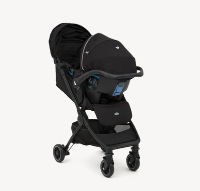  pact travel system in the colour coal black with compatible infant carrier on a right angle